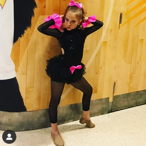 Dance costume competitive, parade sporting events. Black & pink sequin romper